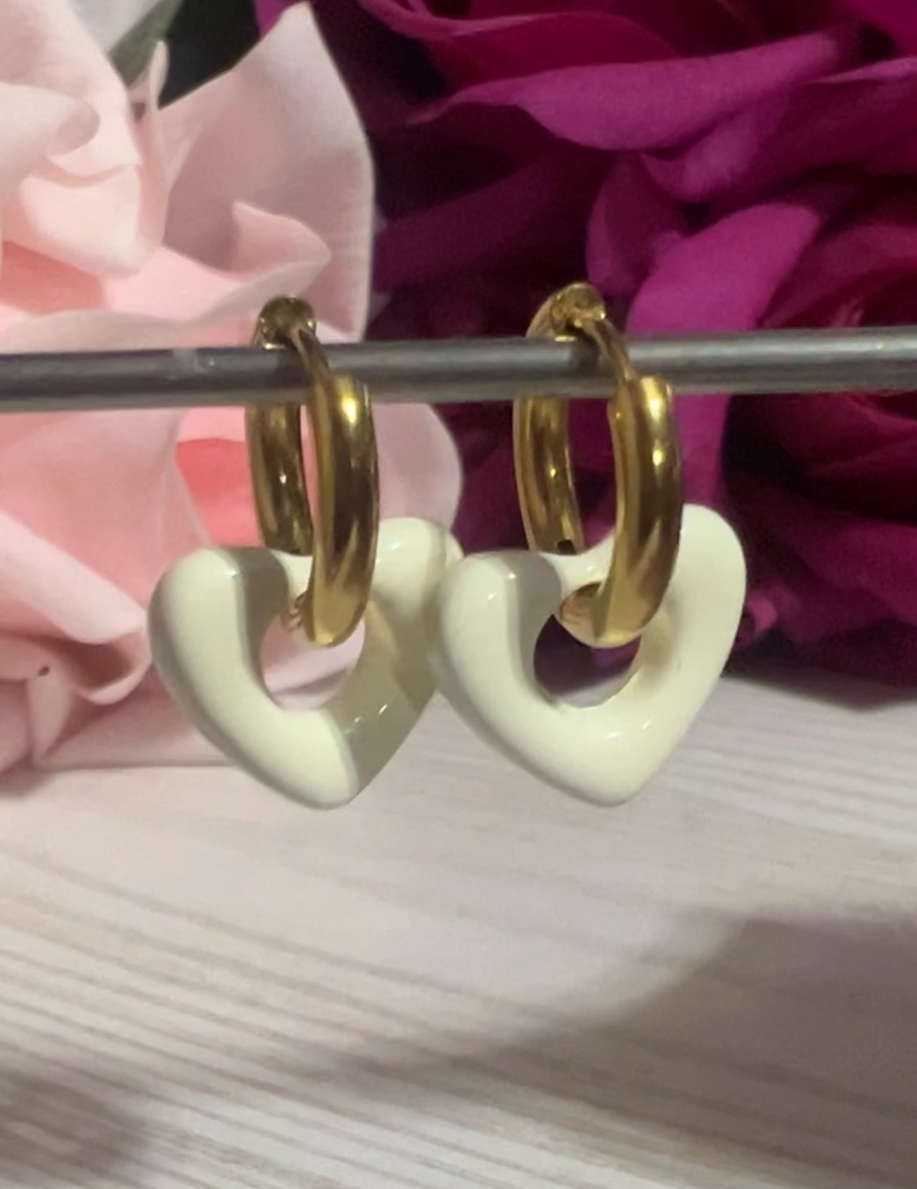 Vanilla crème huggie hoops