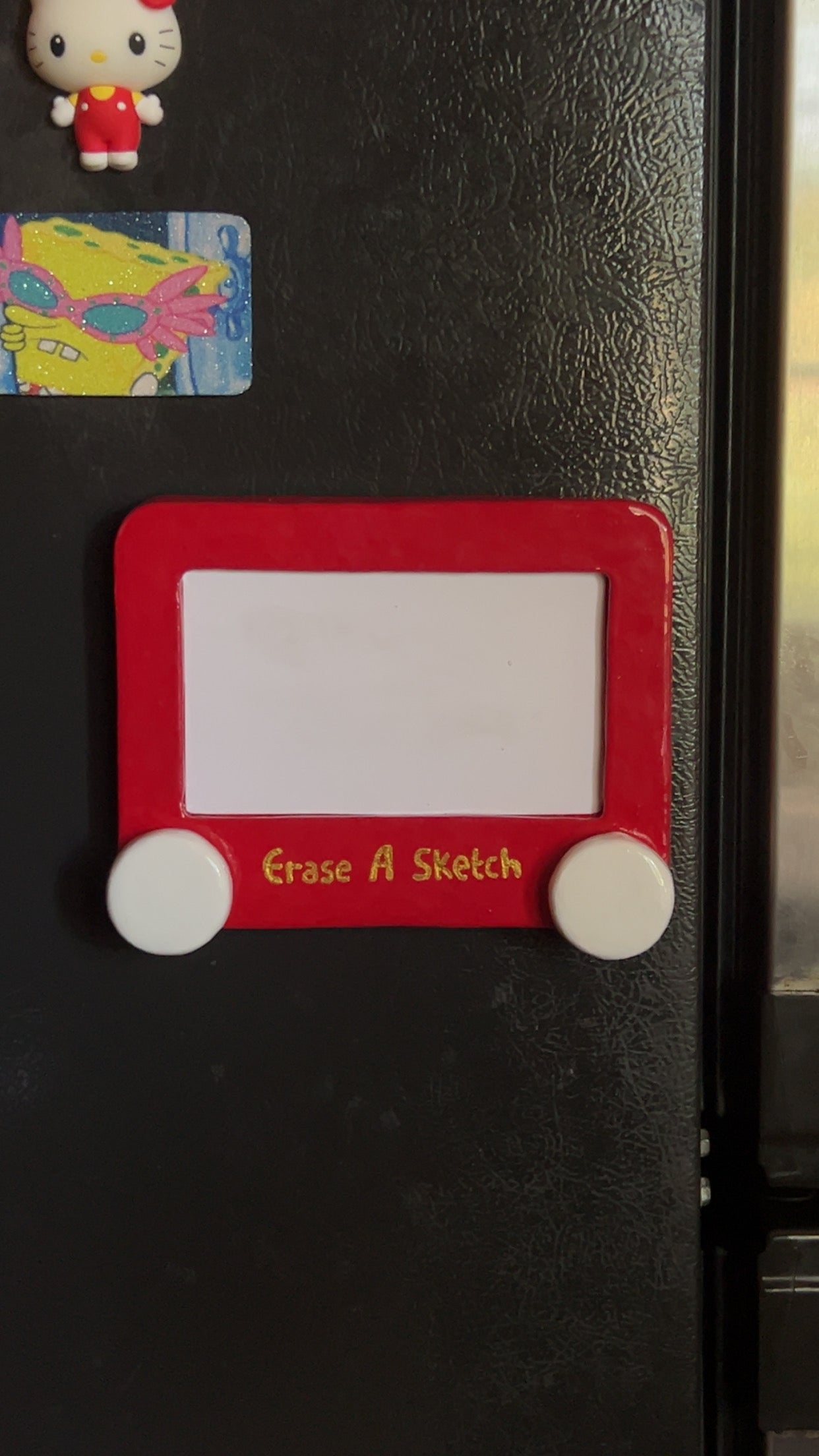 Erase a sketch dry erase board magnet