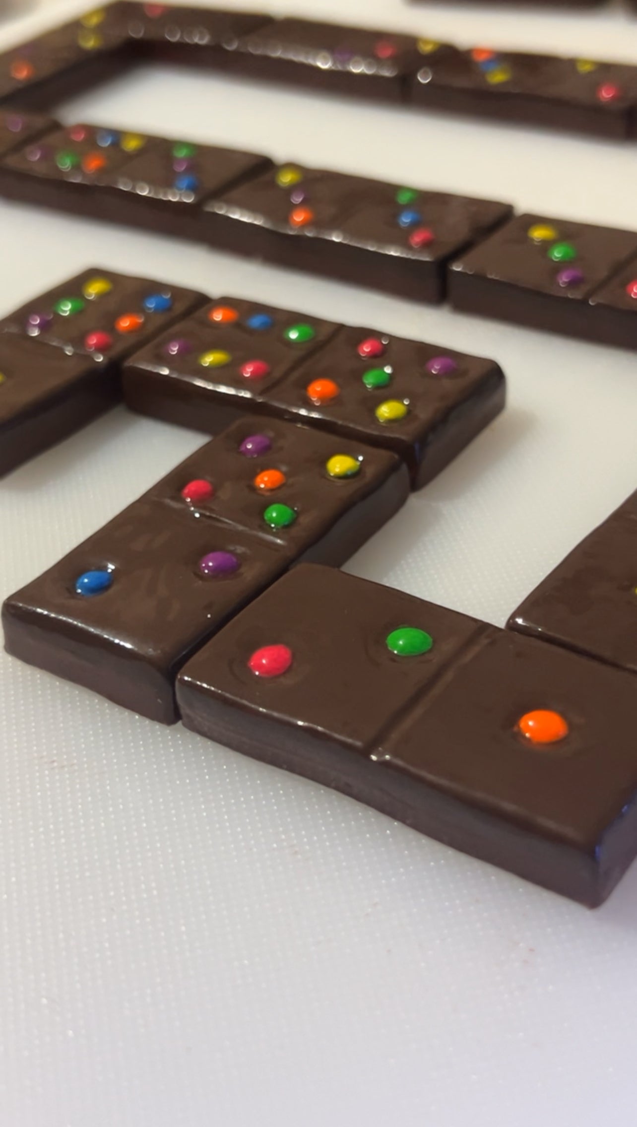 Cosmic brownie dominos